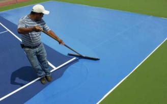 Paint it Blue ~ Tattnall's courts got a new makeover this past July (2007)