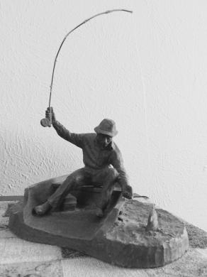 Sculpture of a fisherman